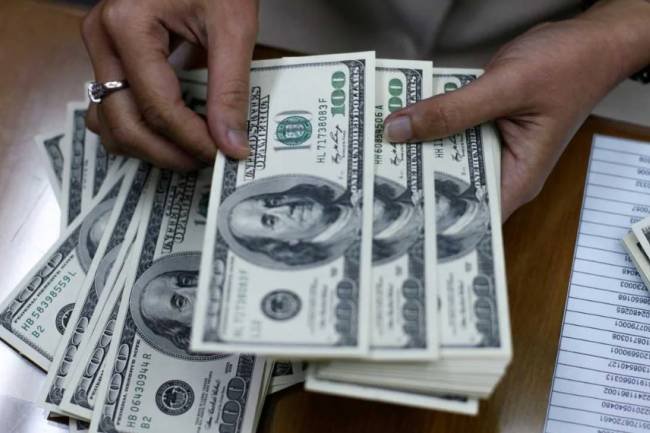 El Gobierno anunciará en las próximas horas el plan para facilitar el uso de dólares no declarados